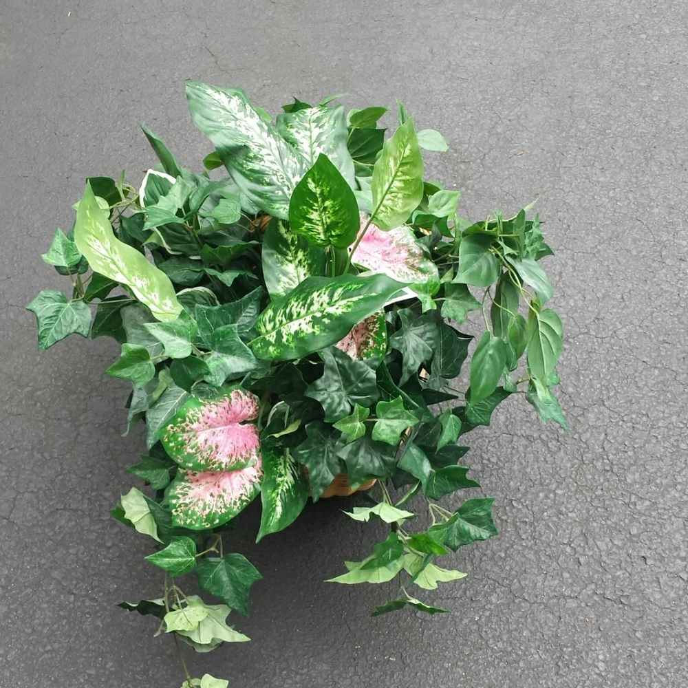Faux plants in a wicker basket